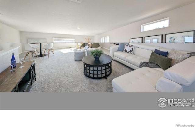 3356 Streamwood Dr, Johnstown, CO 80534 - living room with carpet flooring and healthy amount of natural light