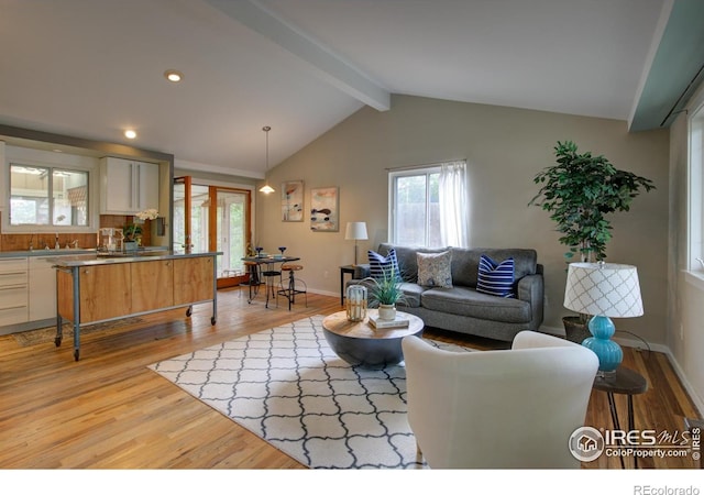1110 Hartford Dr, Boulder, CO 80305 - living area with light wood-style floors, baseboards, and recessed lighting