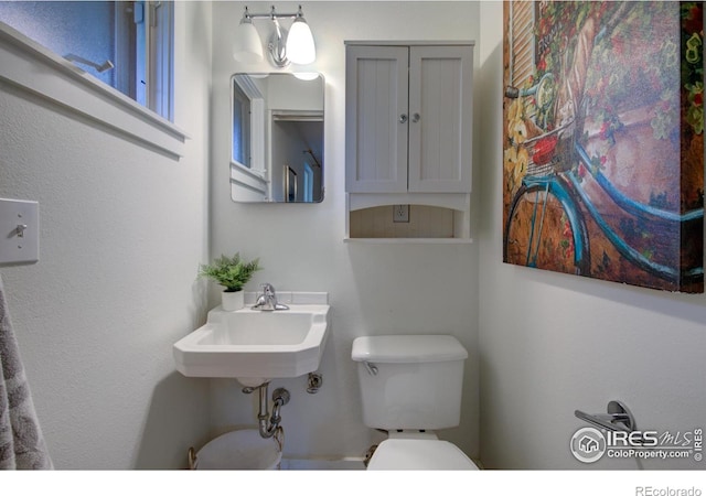 1110 Hartford Dr, Boulder, CO 80305 - half bath with toilet and a sink