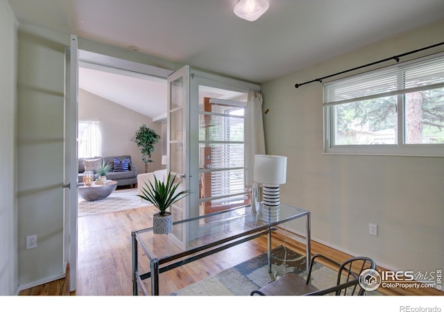 1110 Hartford Dr, Boulder, CO 80305 - office area featuring wood finished floors and lofted ceiling