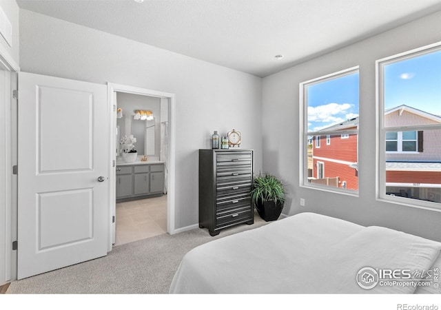 3364 Streamwood Dr, Johnstown, CO 80534 - carpeted bedroom with ensuite bath