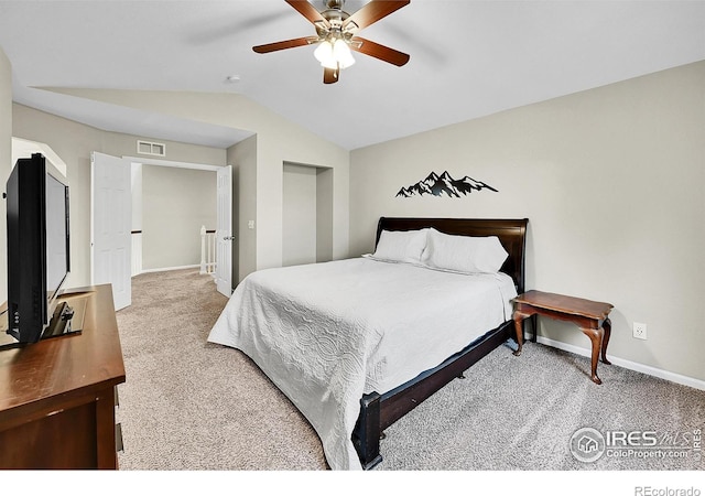 11740 Ivy St, Thornton, CO 80233 - carpeted bedroom featuring lofted ceiling, baseboards, and a ceiling fan