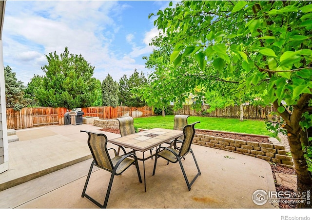 11740 Ivy St, Thornton, CO 80233 - view of patio / terrace featuring outdoor dining area