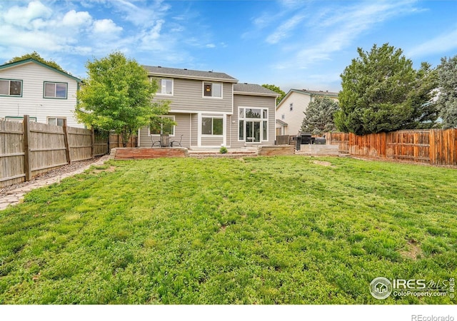 11740 Ivy St, Thornton, CO 80233 - rear view of property with a patio