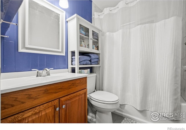 11385 Downing Dr, Northglenn, CO 80233 - full bath with vanity, shower / tub combo, and toilet