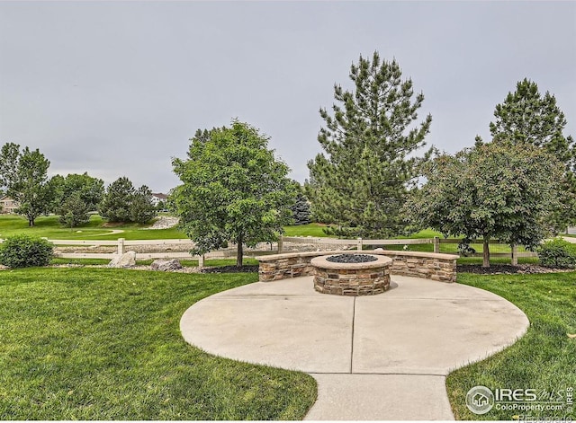 8839 Shetland Dr, Frederick, CO 80504 - view of patio / terrace with a fire pit