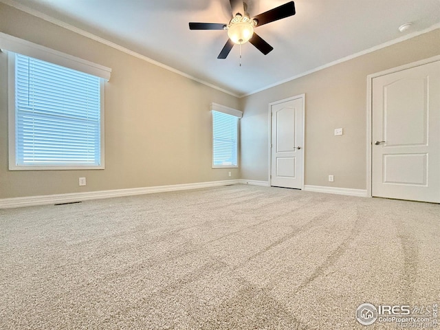 44502 County Road 68, Briggsdale, CO 80611 - unfurnished bedroom featuring crown molding, carpet floors, baseboards, and ceiling fan