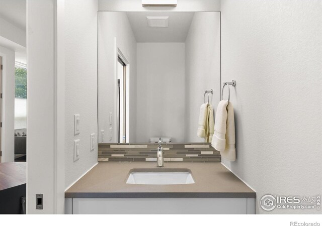876 Cimarron Dr Unit B, Lafayette, CO 80026 - bathroom featuring vanity