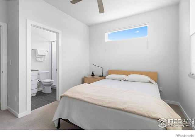 876 Cimarron Dr Unit B, Lafayette, CO 80026 - carpeted bedroom featuring baseboards, ensuite bathroom, and a ceiling fan