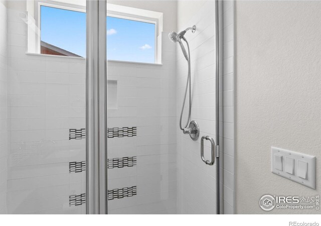 876 Cimarron Dr Unit B, Lafayette, CO 80026 - bathroom with a stall shower