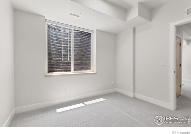 876 Cimarron Dr Unit B, Lafayette, CO 80026 - carpeted spare room with baseboards