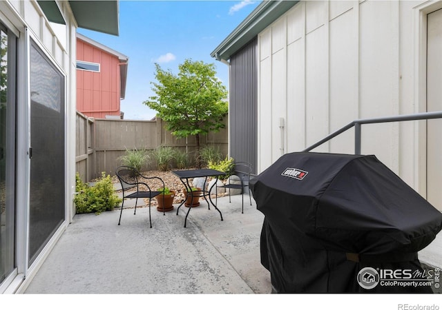 876 Cimarron Dr Unit B, Lafayette, CO 80026 - view of patio with a grill