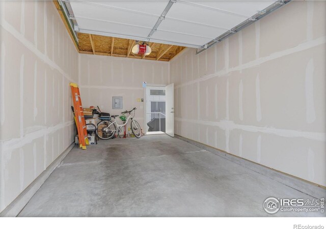 876 Cimarron Dr Unit B, Lafayette, CO 80026 - garage with a garage door opener