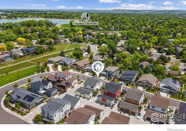 876 Cimarron Dr Unit B, Lafayette, CO 80026 - aerial view of residential area with a large body of water