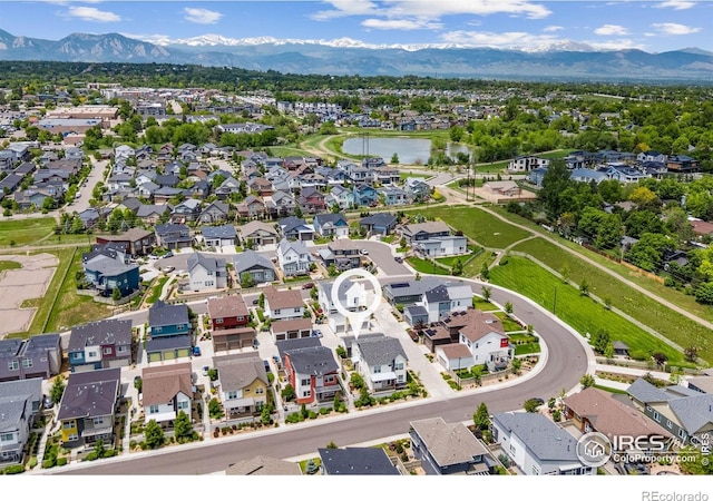 876 Cimarron Dr Unit B, Lafayette, CO 80026 - aerial view of residential area with a water and mountain view