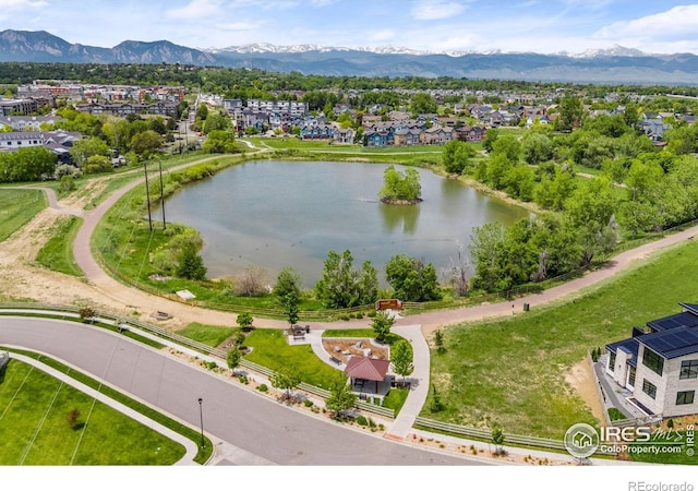 876 Cimarron Dr Unit B, Lafayette, CO 80026 - aerial perspective of suburban area with a water and mountain view