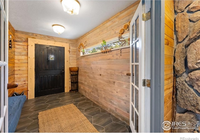 2507 Spencer Mountain Rd, Bellvue, CO 80512 - entrance foyer with wood walls