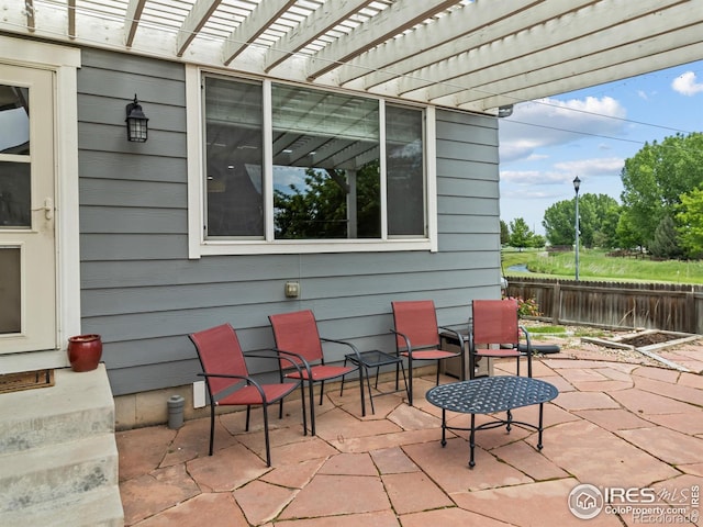 603 Summer Hawk Dr, Longmont, CO 80504 - view of patio with a pergola