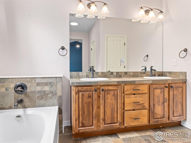 603 Summer Hawk Dr, Longmont, CO 80504 - full bath featuring double vanity and a garden tub