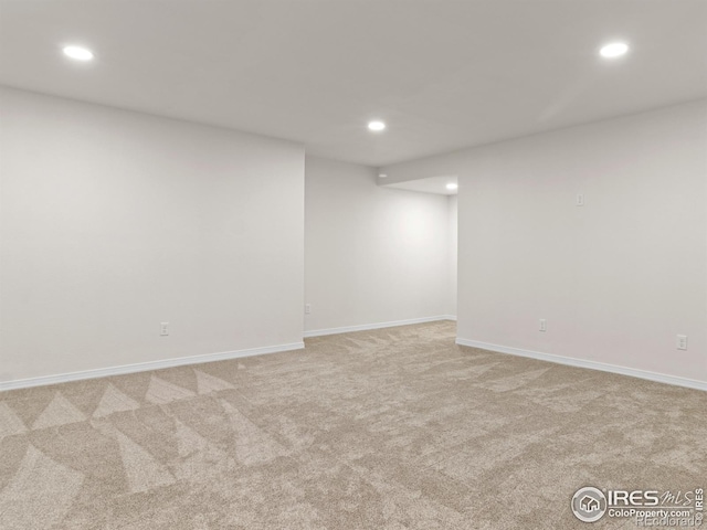 603 Summer Hawk Dr, Longmont, CO 80504 - finished basement with recessed lighting, light carpet, and baseboards