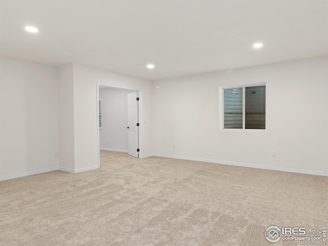 603 Summer Hawk Dr, Longmont, CO 80504 - unfurnished room featuring light carpet, recessed lighting, and baseboards