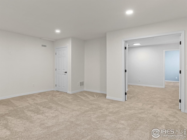 603 Summer Hawk Dr, Longmont, CO 80504 - below grade area with recessed lighting, light colored carpet, and baseboards