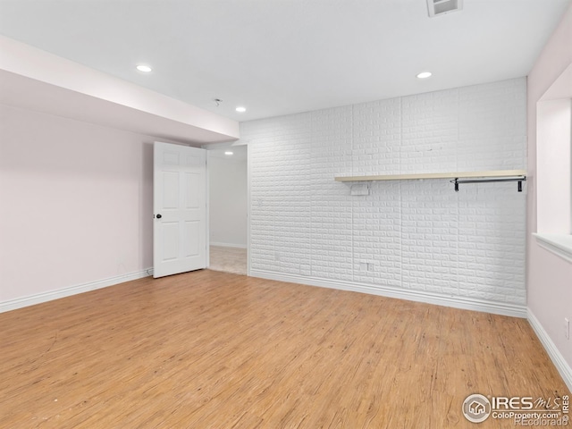 603 Summer Hawk Dr, Longmont, CO 80504 - unfurnished living room with wood finished floors, baseboards, and recessed lighting