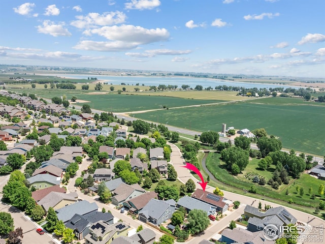 603 Summer Hawk Dr, Longmont, CO 80504 - aerial perspective of suburban area featuring a nearby body of water