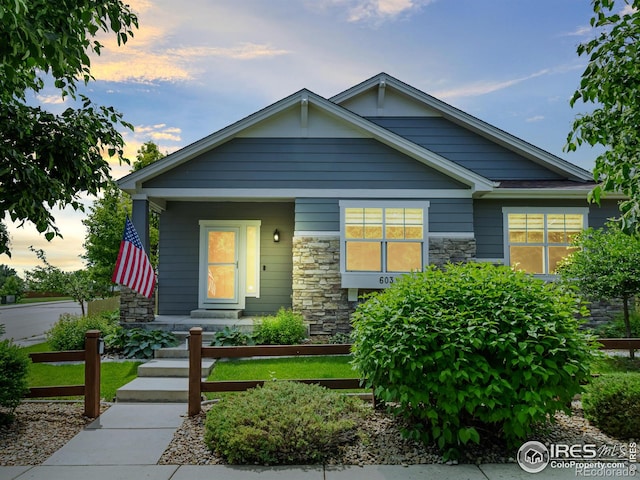 603 Summer Hawk Dr, Longmont, CO 80504 - craftsman house featuring stone siding