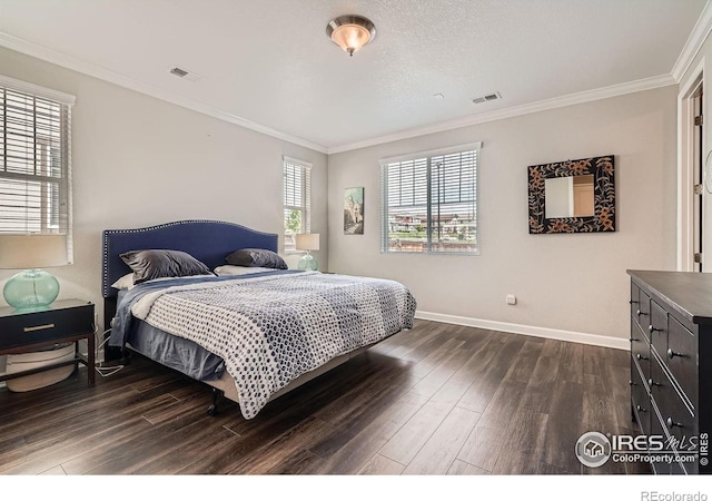 4343 E 96th Way, Thornton, CO 80229 - bedroom with dark wood-type flooring, ornamental molding, and baseboards