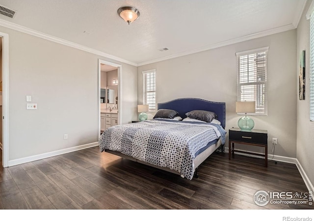 4343 E 96th Way, Thornton, CO 80229 - bedroom with dark wood finished floors, baseboards, crown molding, and a sink