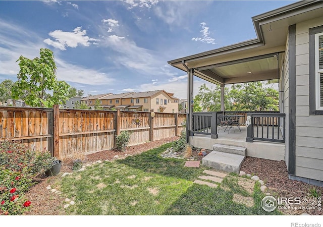 4343 E 96th Way, Thornton, CO 80229 - view of yard with a residential view and a porch
