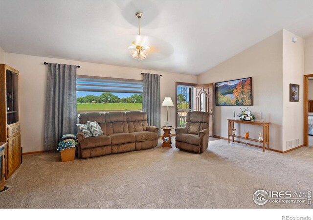 32924 County Road 29, Greeley, CO 80631 - carpeted living area featuring lofted ceiling and baseboards