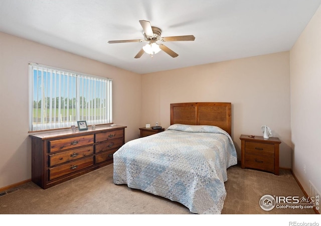 32924 County Road 29, Greeley, CO 80631 - bedroom with carpet flooring, a ceiling fan, and baseboards