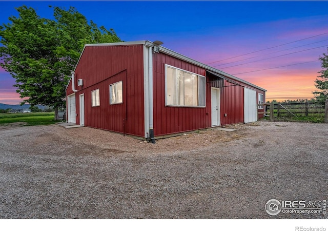 7215 Hygiene Rd, Longmont, CO 80503 - outdoor structure at dusk featuring dirt driveway