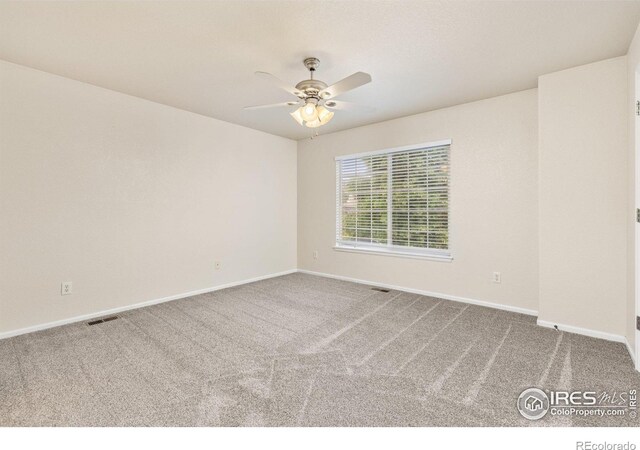 3660 W 25th St Unit 1106, Greeley, CO 80634 - unfurnished room featuring carpet flooring, baseboards, and ceiling fan
