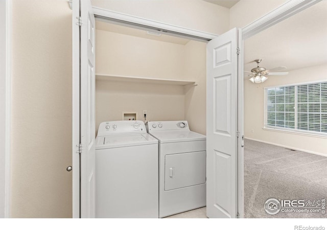 3660 W 25th St Unit 1106, Greeley, CO 80634 - washroom with washing machine and clothes dryer, ceiling fan, light carpet, and baseboards