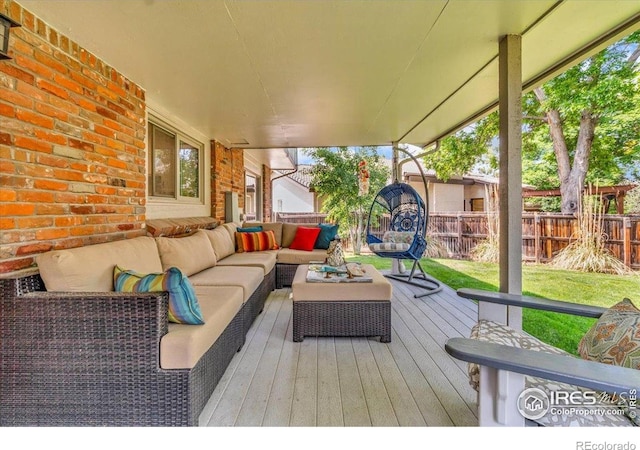 11290 Ranch Pl, Denver, CO 80234 - wooden deck with outdoor lounge area