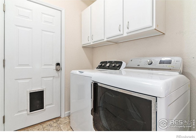 264 Alder Ave, Johnstown, CO 80534 - laundry area with washing machine and clothes dryer and cabinet space