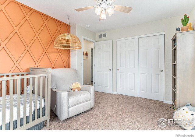 264 Alder Ave, Johnstown, CO 80534 - carpeted bedroom with a closet, a nursery area, and a ceiling fan