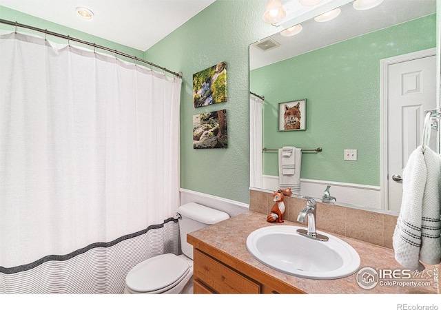 264 Alder Ave, Johnstown, CO 80534 - full bath with vanity, toilet, and a textured wall