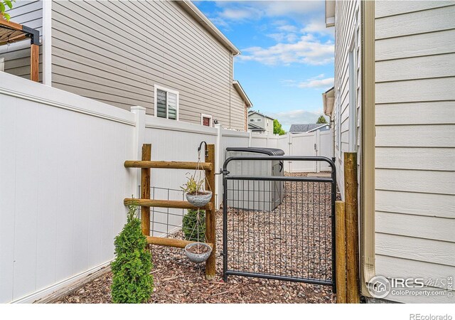 264 Alder Ave, Johnstown, CO 80534 - view of side of property featuring a gate