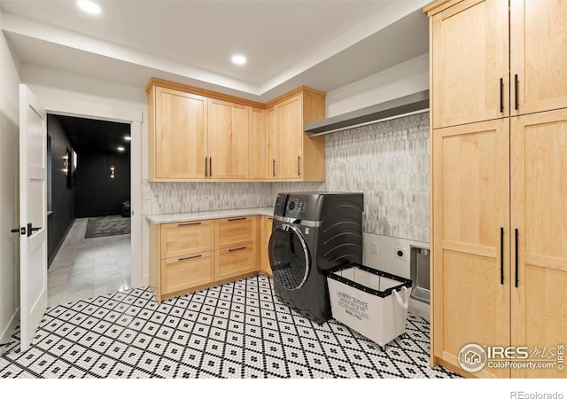 37179 Soaring Eagle Cir, Severance, CO 80550 - laundry area featuring washer / dryer, cabinet space, and recessed lighting
