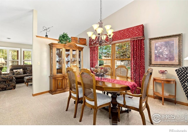 1142 Muirfield Way, Fort Collins, CO 80525 - dining area featuring light carpet, a chandelier, vaulted ceiling, and baseboards