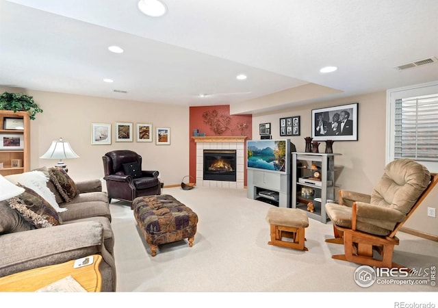 1142 Muirfield Way, Fort Collins, CO 80525 - living area featuring recessed lighting, carpet, a tile fireplace, and baseboards