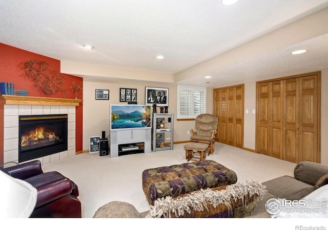 1142 Muirfield Way, Fort Collins, CO 80525 - living area with carpet flooring, recessed lighting, a fireplace, and baseboards