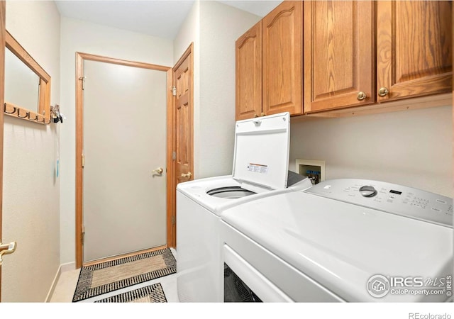 1142 Muirfield Way, Fort Collins, CO 80525 - washroom with separate washer and dryer and cabinet space