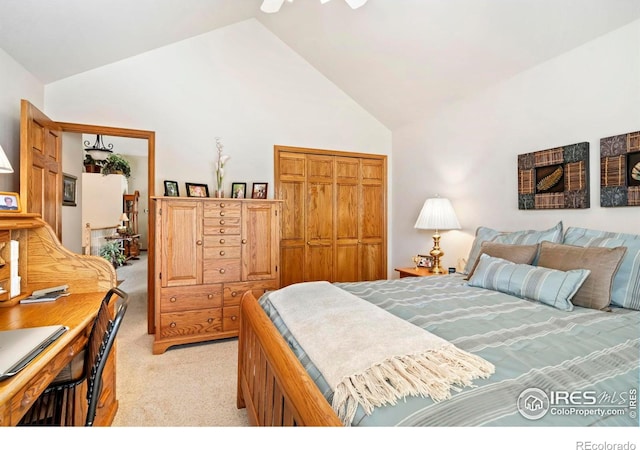 1142 Muirfield Way, Fort Collins, CO 80525 - bedroom with light colored carpet, high vaulted ceiling, and a closet