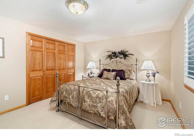 1142 Muirfield Way, Fort Collins, CO 80525 - bedroom with carpet flooring, baseboards, and a closet