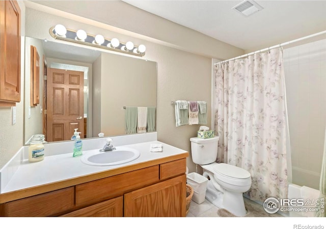 1142 Muirfield Way, Fort Collins, CO 80525 - bathroom featuring toilet, vanity, shower / bath combo with shower curtain, and tile patterned flooring